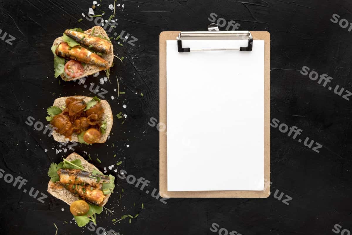 Yuqori ko'rinishdagi bahol taomlari notatnik bilan | Top view seafood dishes with notepad 1