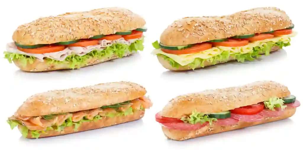 Salam jambon pishloq losos baliq butun don bilan yig'ish sub sendvich izolyatsiya oq | Collection sub sandwiches with salami ham cheese salmon fish whole grains isolated white