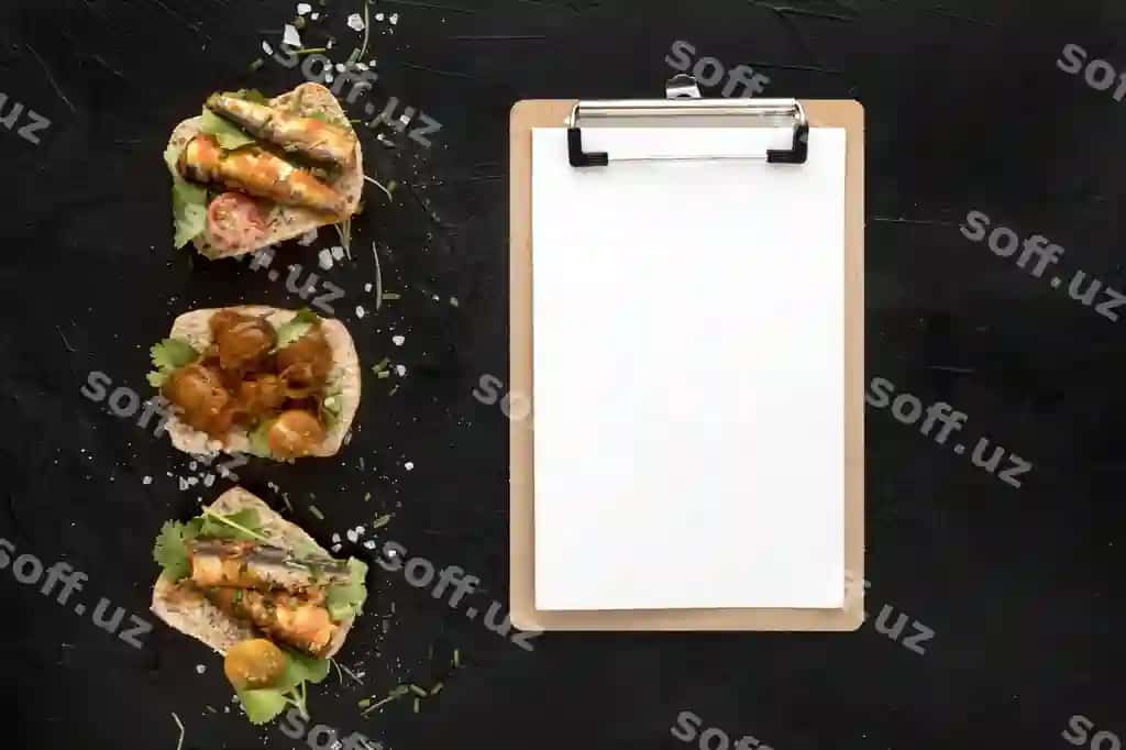 Yuqori ko'rinishdagi bahol taomlari notatnik bilan | Top view seafood dishes with notepad 2