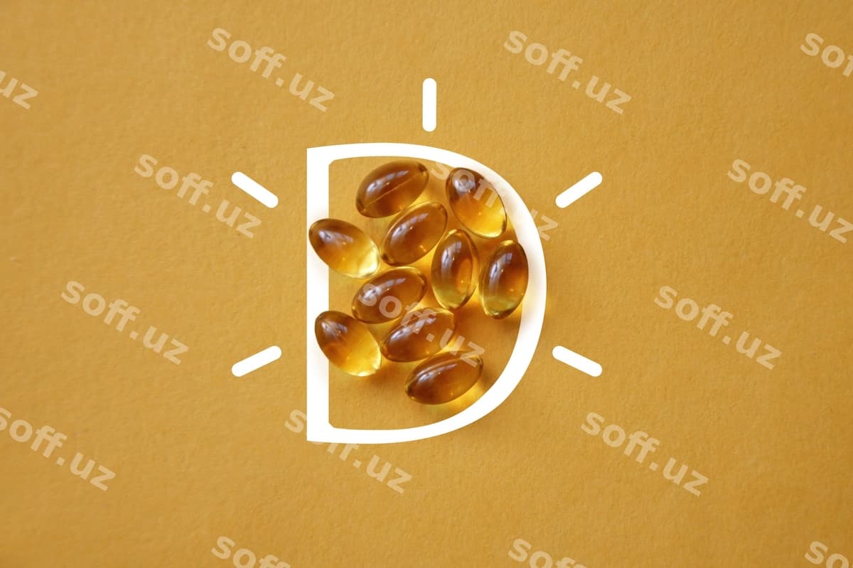 Vitamin D kapsullar sariq orqa fonda | Vitamin d capsules yellow background
